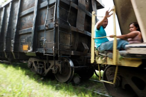 Migrants making the arduous trek through Mexico often ride the cargo trains collectively known as “La Bestia” (“The Beast”) to advance northward quickly. Confrontations with danger are imminent: Running to hop on the speeding train without losing a limb, climbing to the roof of a car without dropping a small child, sleeping at night without falling off, and escaping “la migra” (“immigration police”) during a raid are all formidable and commonplace tasks that exhausted migrants face. More Central American women than ever are making this journey, but they often remain invisible in the dominant narratives of clandestine migration until they become victims.
