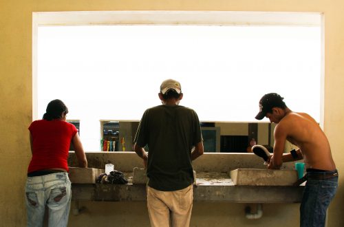 Shelters, mostly run by the Catholic Church, provide migrants with meals and a place to rest for a few days. These locales are complicated spaces, offering relief and safety in exchange for strict rules and near-total surveillance. Despite the tradeoffs, shelters like this one in Pakal-Na can provide moments of normalcy and routine. During the migration process the opportunity to do even tedious chores, like handwashing clothes, can feel like a luxury.