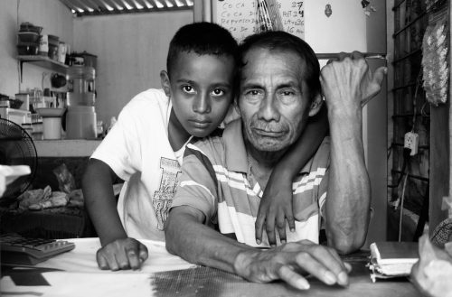 At their shop on the edge of Pakal-Na, Don Chava and his grandson rely on migrants to buy water, bags of chips, and other small items as they come into town looking for the shelter.