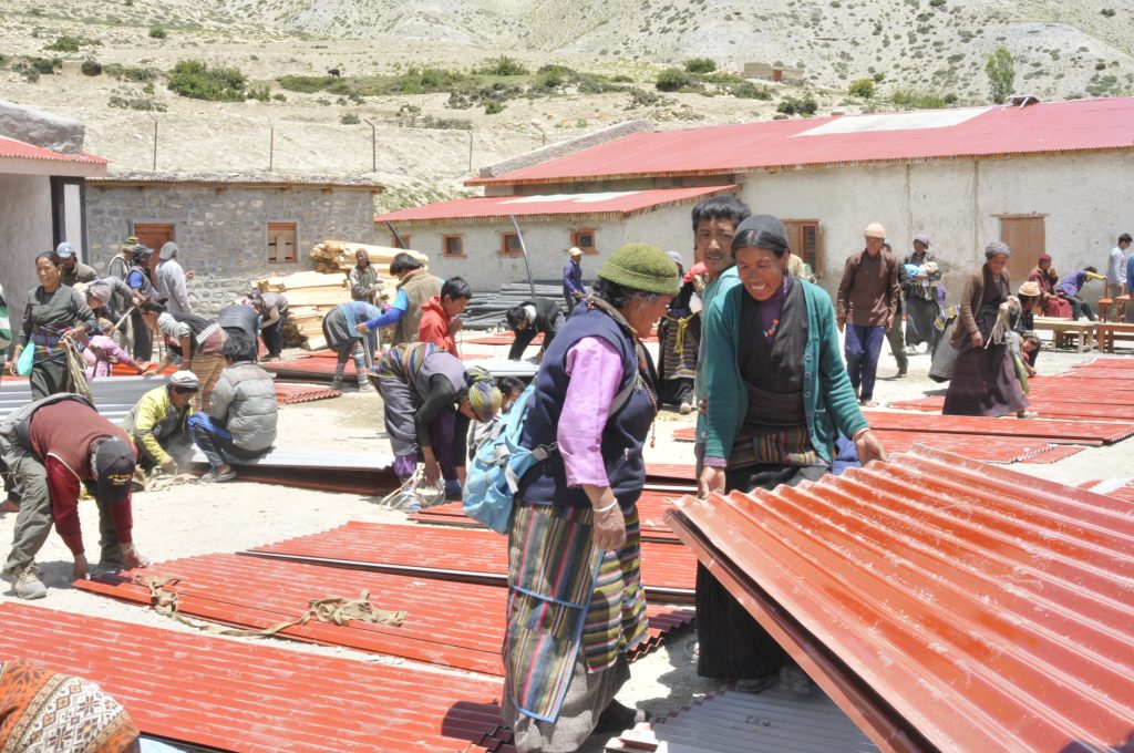 Tin and other building materials were distributed in Ghiling Village, Upper Mustang. Funds for the materials and transporting them to Mustang were raised through local youth and community networks, including by community researchers on this project.