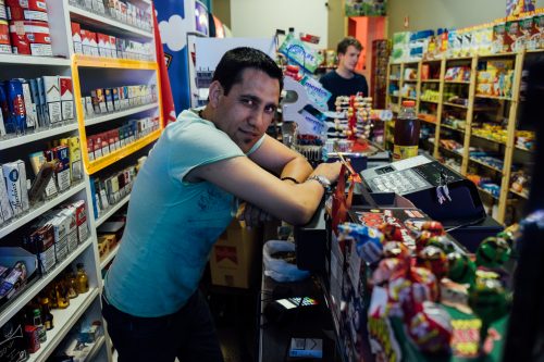 Zabi is originally from the Parwan province in Afghanistan. He was the first of his family to make the journey to Belgium, having arrived in 1999. He currently owns and operates a night shop in the south of the city; two of his brothers also own shops—one a news agent and the other a food store—in Antwerp.