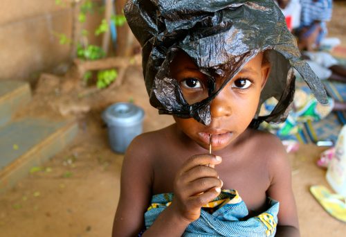 During the birth that causes fistula, 90 percent of babies die. Because women with fistula tend to have very poor access to maternal health care throughout their lives, when I counted stillbirths of all full-term pregnancies, the 100 women with fistula I came to know had a 76 percent child mortality rate. Beyond the doors of any fistula center, groups of children roam and play, but on the grounds of fistula hospitals, children are rare. Using discarded catheters and IV tubing as jump ropes and cardboard boxes as play cars, the handful of kids create a life of make believe in these confined, transitional spaces of waiting.