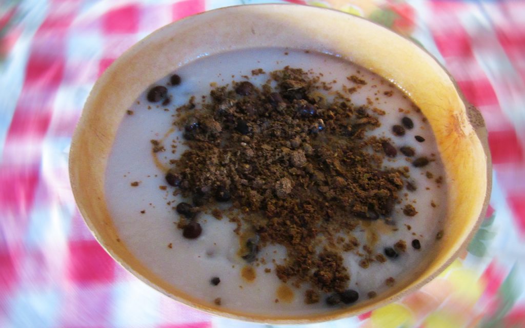 Learning how to eat atole, a standard of traditional Mexican cuisine, required the help of newfound friends.