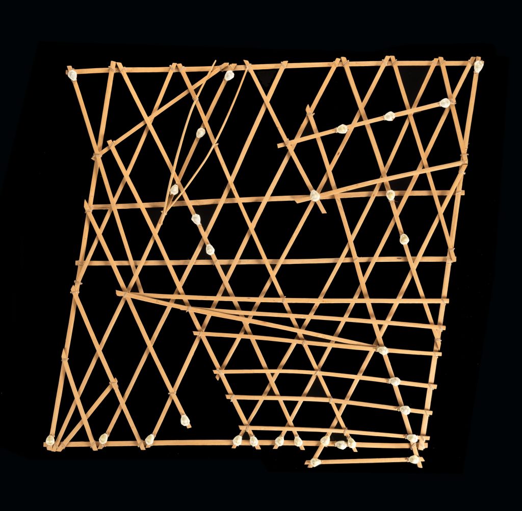 It would be hard to guess, but this arrangement of bamboo sticks and cowrie shells makes up a map of the ocean and the greater Marshall Islands region.