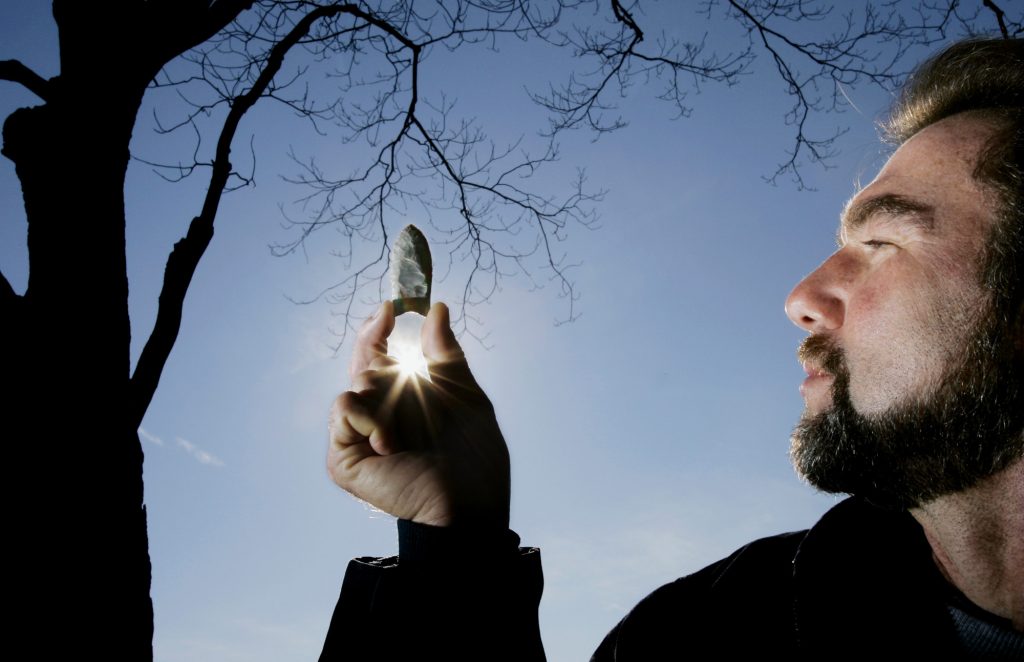 Since the 1920s, scientists have debated whether the first Americans arrived from Asia—or somewhere else—some 11,000 years ago, or millennia before. Artifacts such as this Clovis spear point have provided some clues, but new multidisciplinary research is filling in the picture.