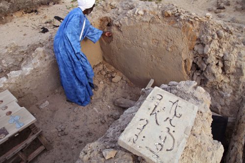 Cultural heritage - In 2012, Islamic extremists severely damaged nine historic mausoleums in Timbuktu, Mali. Local masons, like the man shown here, rallied to rebuild them before they were further degraded by exposure to the elements.
