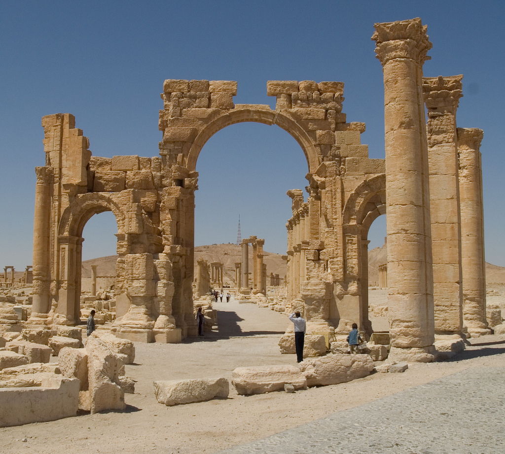 Cultural heritage - Palmyra was attacked by ISIS in 2015. The Arch of Triumph, shown here the way it looked before the attack, was almost completely destroyed. Many referred to the destruction as “cultural genocide.”