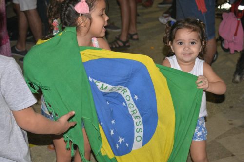 Olympic festival -- The parade of athletes followed the artistic program, shifting the sentiment of the live-site crowd from globalism to nationalism. Many spectators were draped in national flags, which they waved when their countries’ teams appeared on the screen. South American athletes got big cheers, but the longest ovation was for the Refugee Olympic Team, which was created for the first time by the IOC to support athletes affected by international crises.