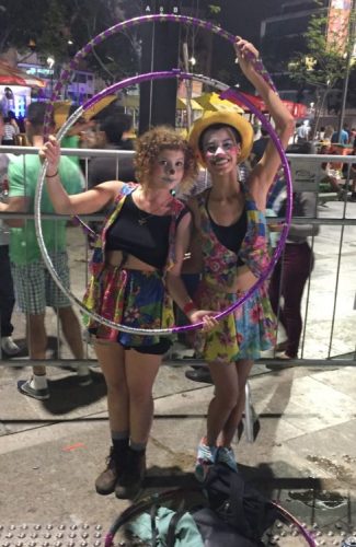Olympic festival -- People at the live site were not wearing carnivalesque costumes, but the broadcast concluded with samba dancing and parts of the crowd in the square undulating in unison. These two women were the only street performers we encountered.