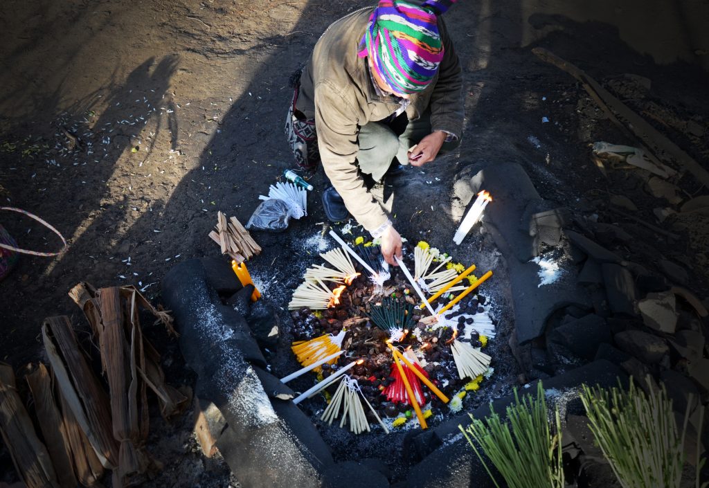 A Maya shaman in Guatemala performs a ritual to ward off evil spirits. Our world is a stressful and unpredictable place, and ritual offers a sense of structure and stability. My colleagues and I used motion detectors to examine how anxiety affects ritualized behavior. We found that when participants engaged in a stressful task, their hand movements became more repetitive and patterned. This hints that ritualization might be a coping strategy against stress.