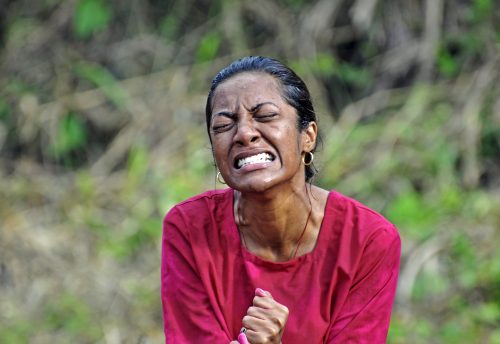 A woman in Mauritius falls into a trance during an ecstatic collective ritual. From ancient shamanic rites to modern rave parties, humans seem to have a primordial craving to achieve altered states of consciousness. The trance state shown here can spread like wildfire in an impressive demonstration of emotional contagion.