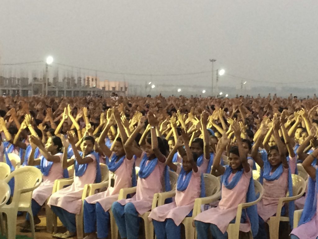 Indigenous education - A sea of some 22,500 KISS students performs in 2014 for dignitaries from 23 countries. Such ceremonies showcase the school to visitors and build solidarity among students.