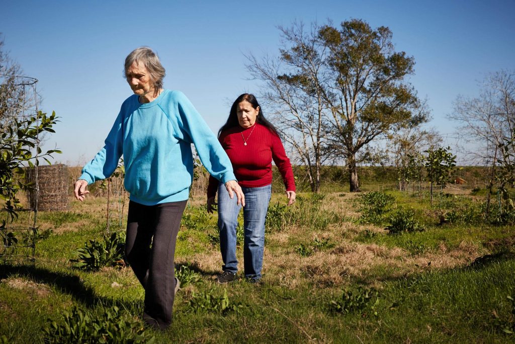 Theresa Dardar and her mother-in-law Nazia Dardar in their garden.