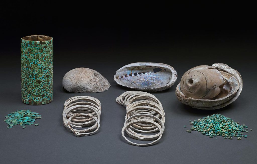 essay extends debate over dna discovery Chaco canyon NAGPRA - Turquoise beads, shell bracelets, haliotis shells, and a mosaic cylinder basket were among the artifacts found with the remains in the Pueblo Bonito burial crypt.
