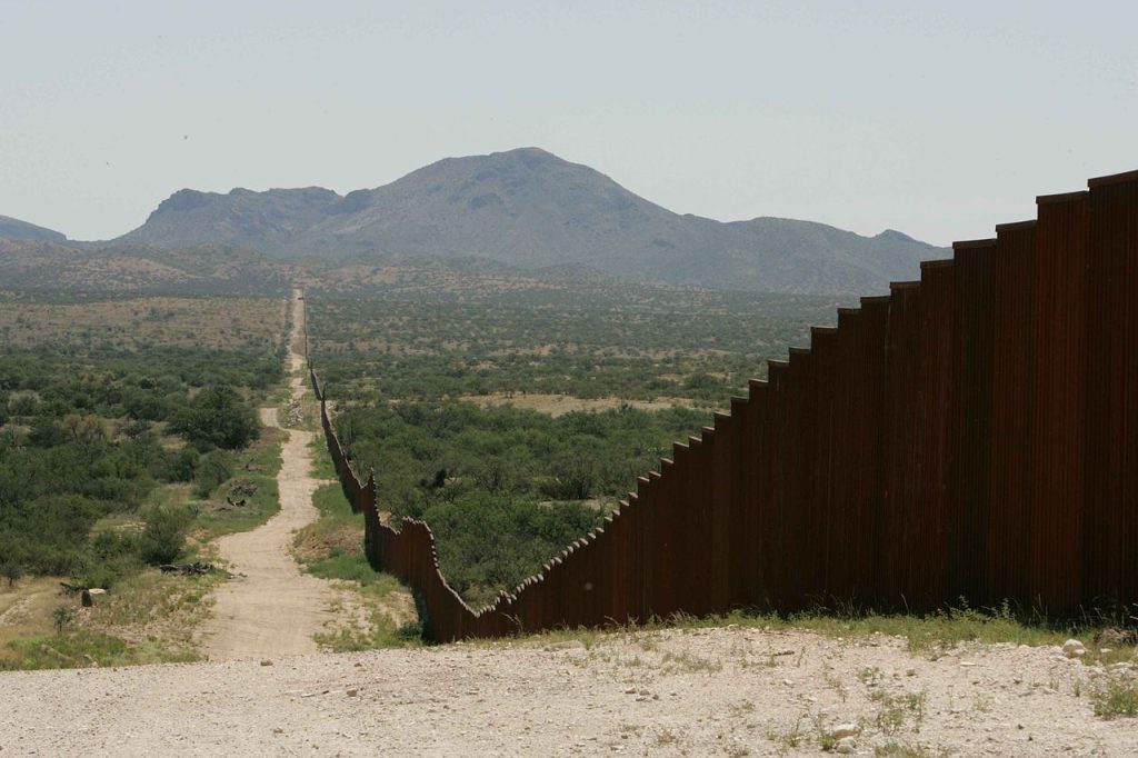 The border wall between the United States and Mexico might actually help people cross by creating roads in otherwise inhospitable environments.