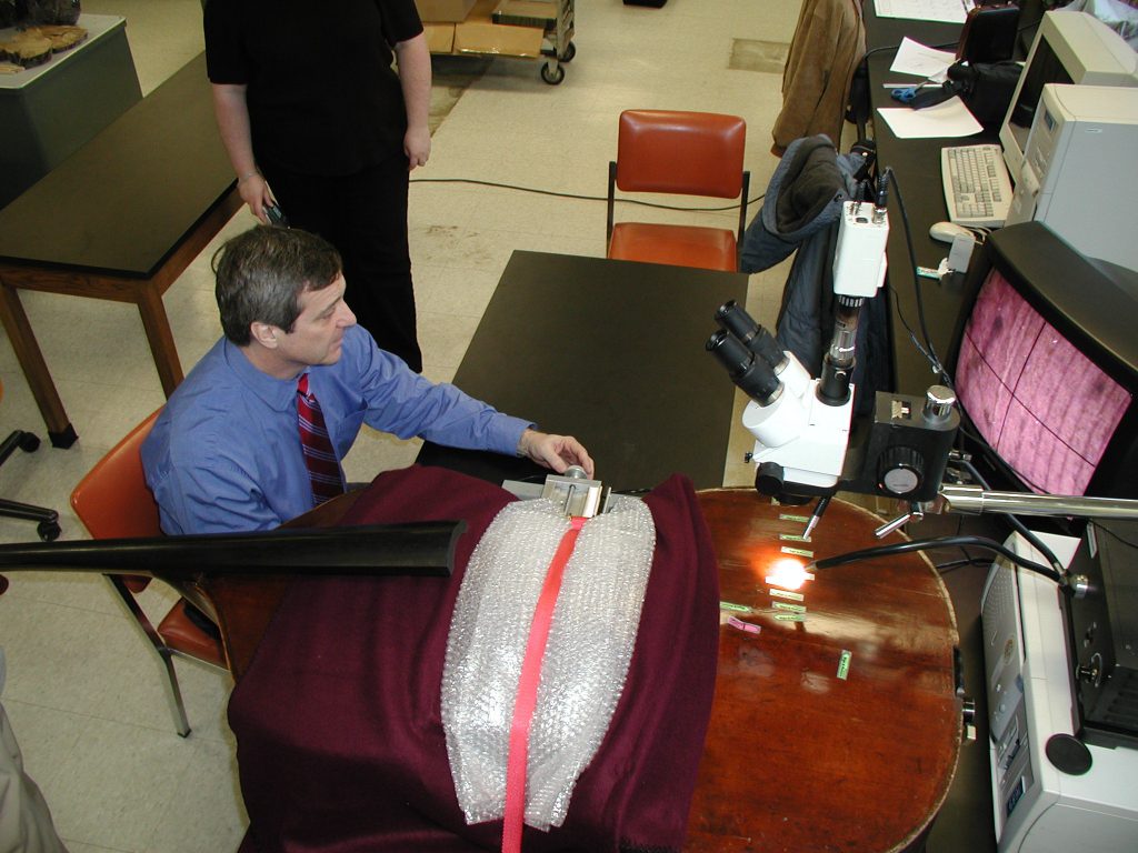 Dendrochronologist Henri Grissino-Mayer and colleagues study the tree rings in the Karr-Koussevitzky double bass. Their analysis ultimately determined that the instrument was built much later than previously thought.