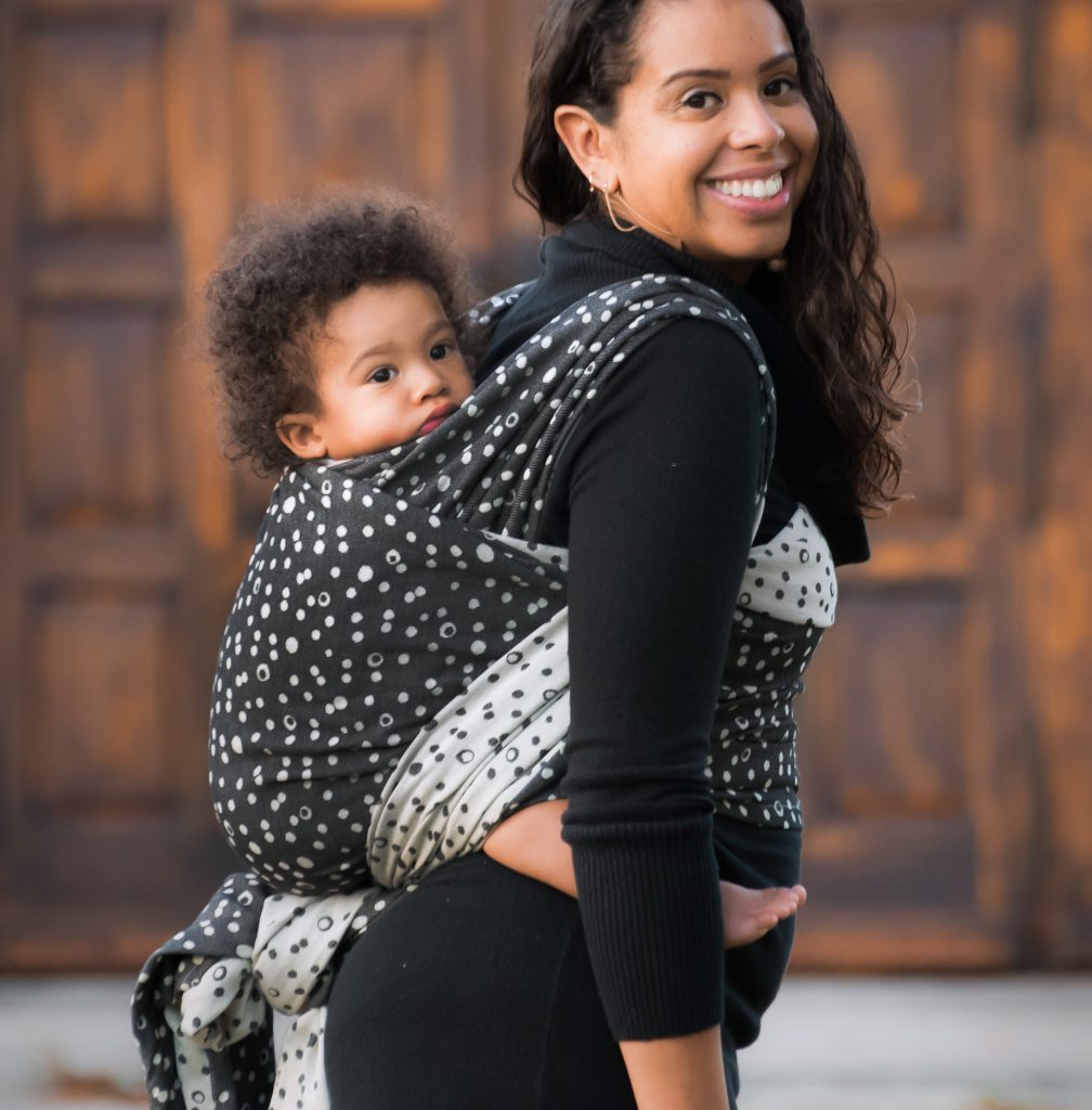 Mothers often carefully choose the wraps and carriers they wear, since these accessories are an extension of their own identity.