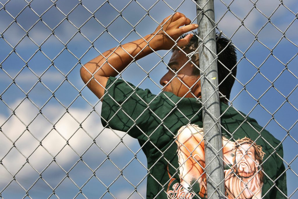 Modern day slavery - A farmworker listens to a representative from the Florida-based Coalition of Immokalee Workers, a human rights organization, and Ethel Kennedy speak as part of the Robert F. Kennedy Memorial Poverty Tour in 2006.