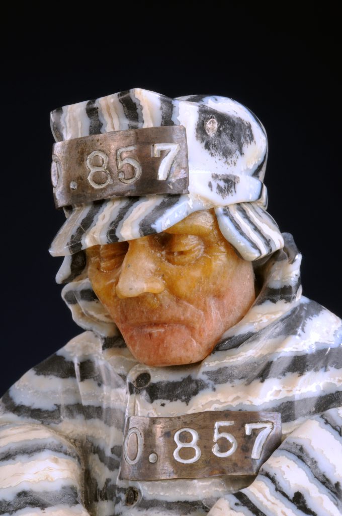 Prison art - Konovalenko's expert use of natural variation in the quartz gave the prisoners specific facial characteristics—such as this figure’s jaundiced appearance.