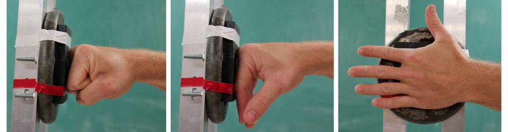 A series of three fists hitting a pad.