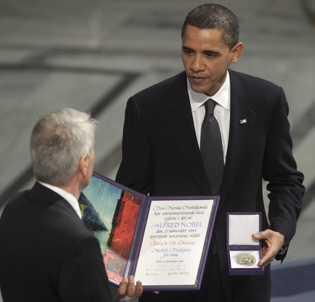 President Obama receives a prize.