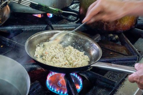Chef Maguiña prepares p’esque, a local dish, with a twist. He infuses the red quinoa with grape juice extract to change the flavor and create a pop of color.