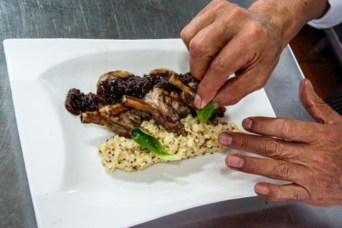 The main course: The p’esque shares the plate with the main attraction of baby alpaca ribs, garnished with a caramelized onion sauce.