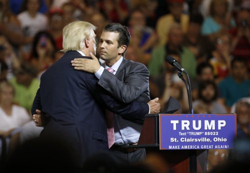 human evolution politics - Republican presidential candidate Donald Trump, left, hugs his son Donald Trump Jr. during a rally at Ohio University Eastern Campus in St. Clairsville, Ohio, Tuesday, June 28, 2016.