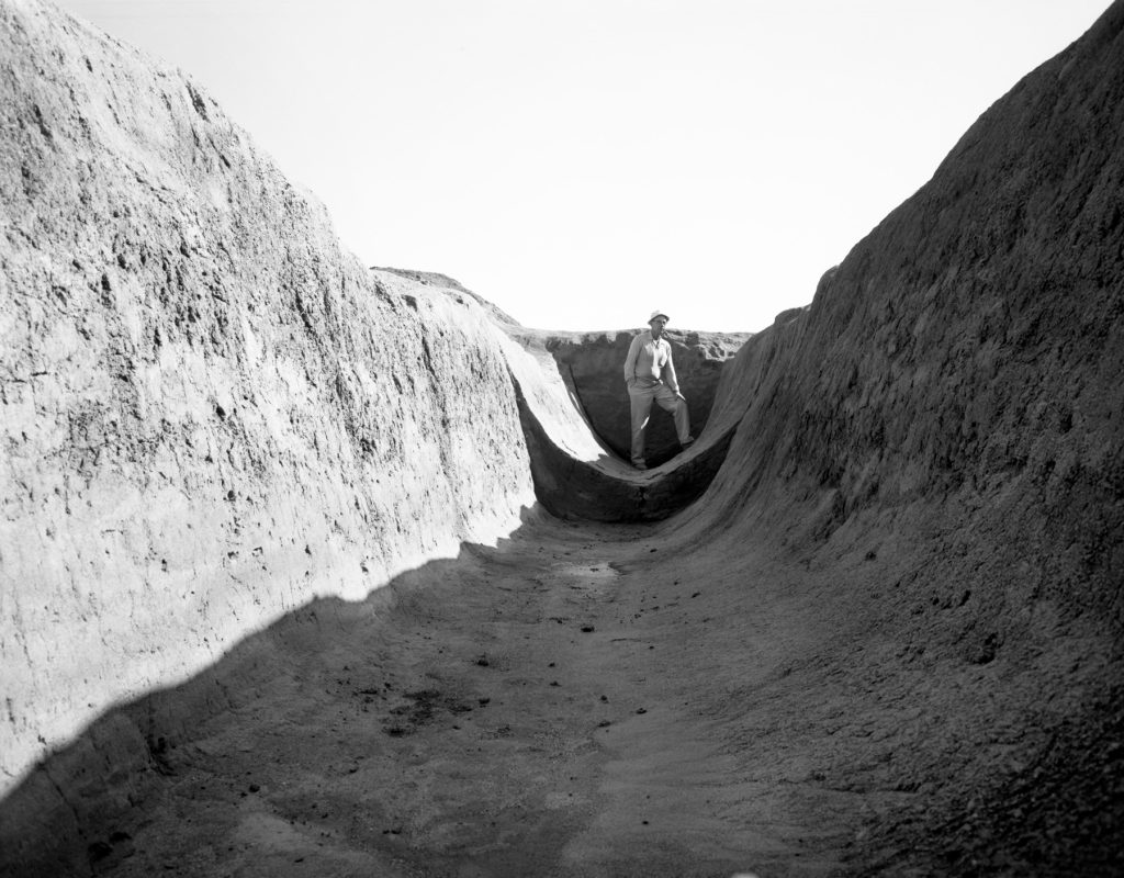 The Hohokam’s heavy reliance on an extensive water infrastructure—portrayed here in this canal that runs below the city of Phoenix—ultimately may have caused them to be vulnerable in the face of new environmental challenges.