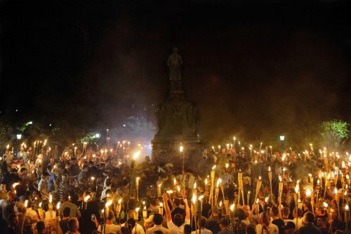 charlottesville violence - White supremacists surrounded counterprotesters at the University of Virginia campus on August 11.