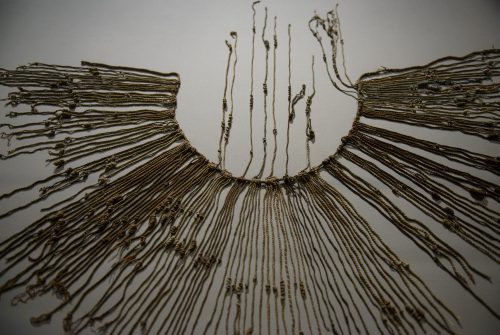 This khipu, which was made before the Spanish conquest of the Incas, was probably used for accounting, as indicated by the knots in the cords.