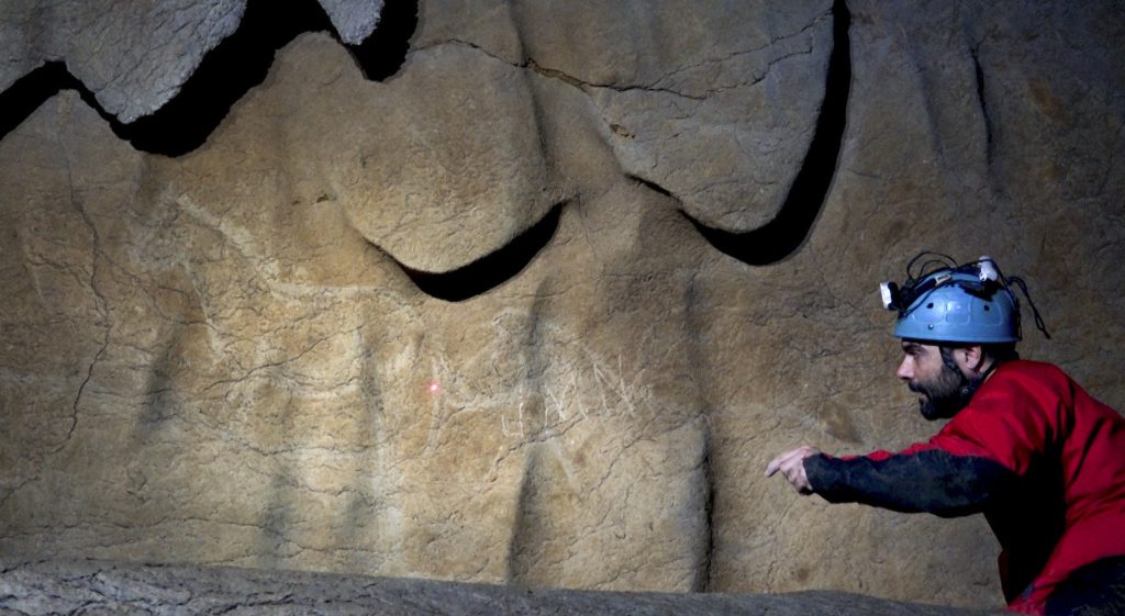 Atxurra cave art - Figures of horses in the Atxurra cave system in Spain astounded archaeologist Diego Garate, who shines his headlamp on this previously unknown panel of artwork.