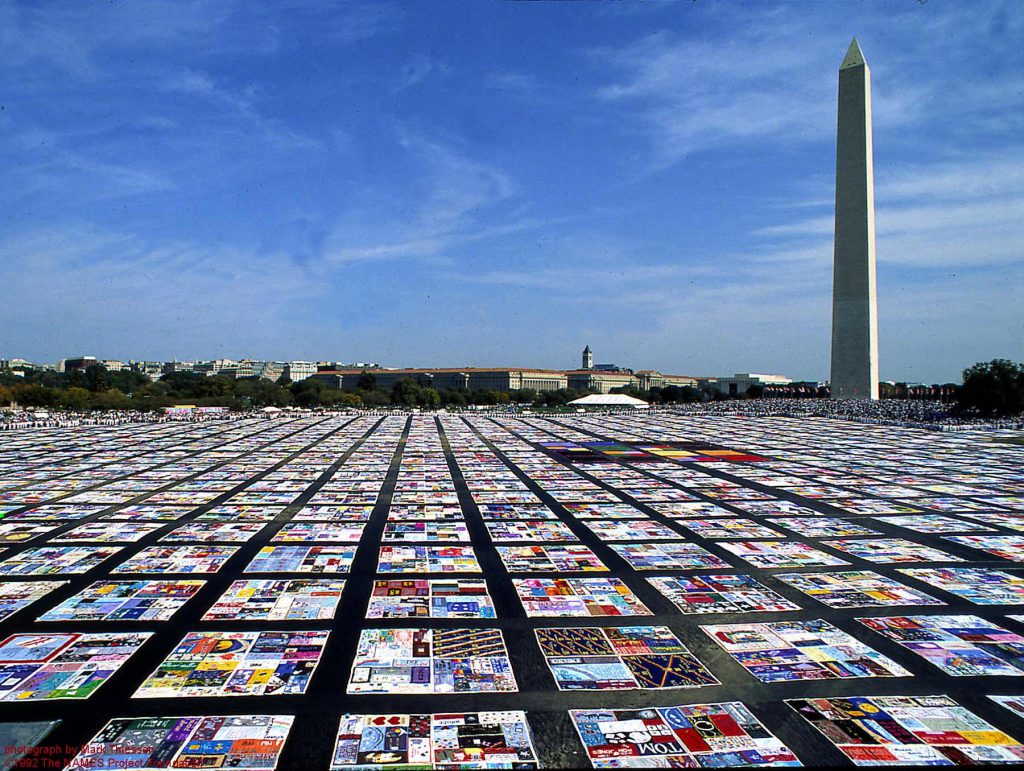 The AIDS memorial quilt, laid out here in front of the Washington Monument, honors the lives of those who died from the disease.