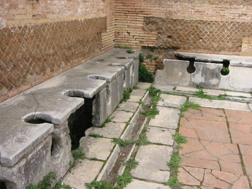 ancient roman bathrooms - To ancient Romans, the practice of sitting on a shared toilet in an open room full of people was entirely ordinary.