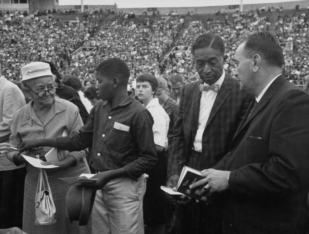 At Graham’s revivals, African-Americans and European-Americans were integrated in the audience and included together in his ministry teams.