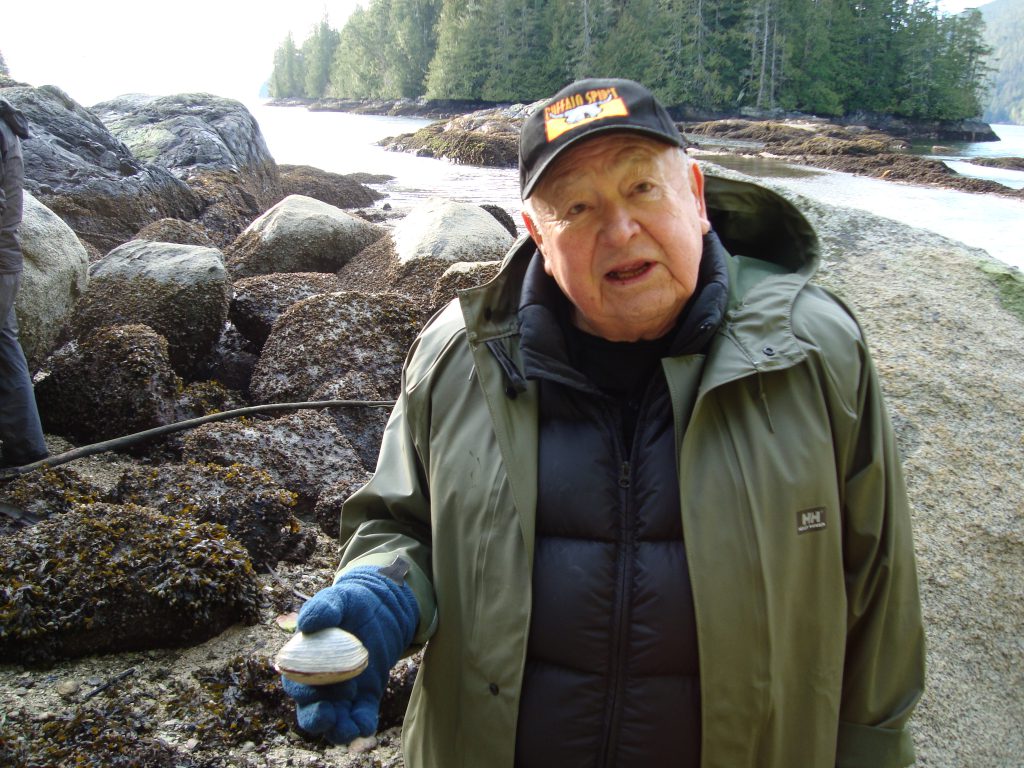 Traditional Ecological Knowledge - Kwaxsistalla Chief Adam Dick with a butter clam.