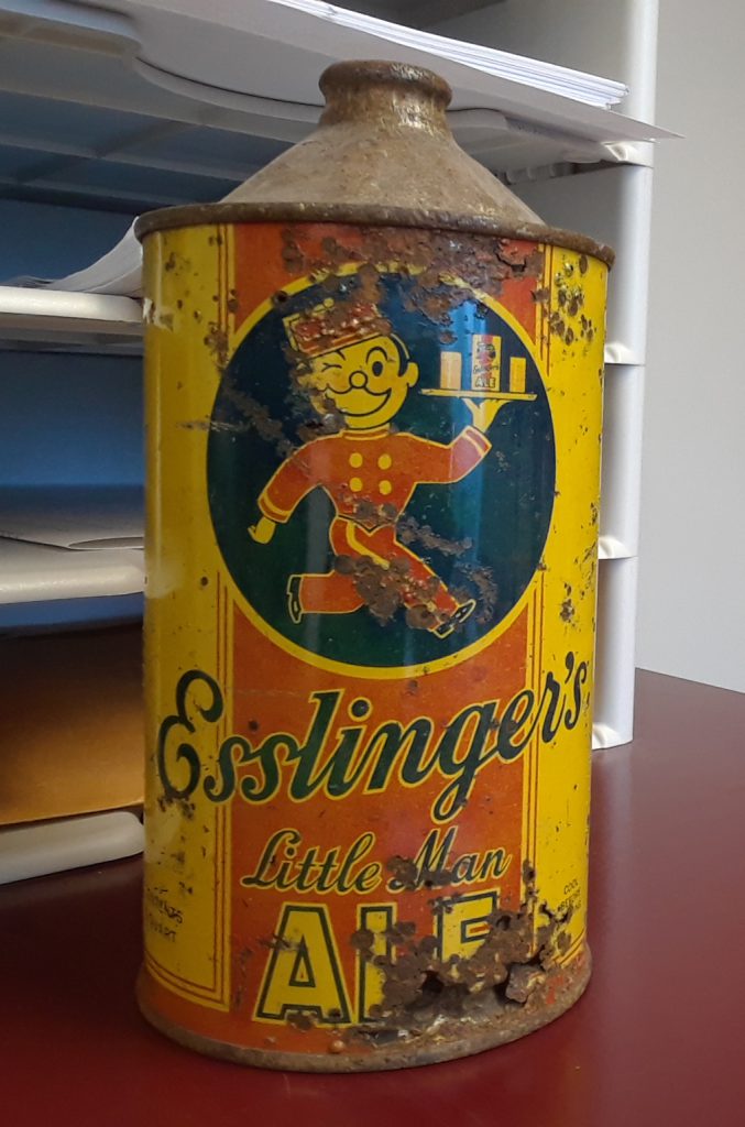 Some early cans, like this one, were shaped so that canners could seal them with bottle tops.