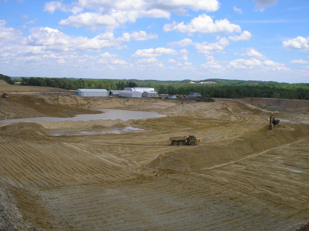 fracking rural wisconsin - Much of Harlan and Edith’s former farm in Dovre, Wisconsin, has been ripped open by sand mining. Another mine cuts into a distant hillside.