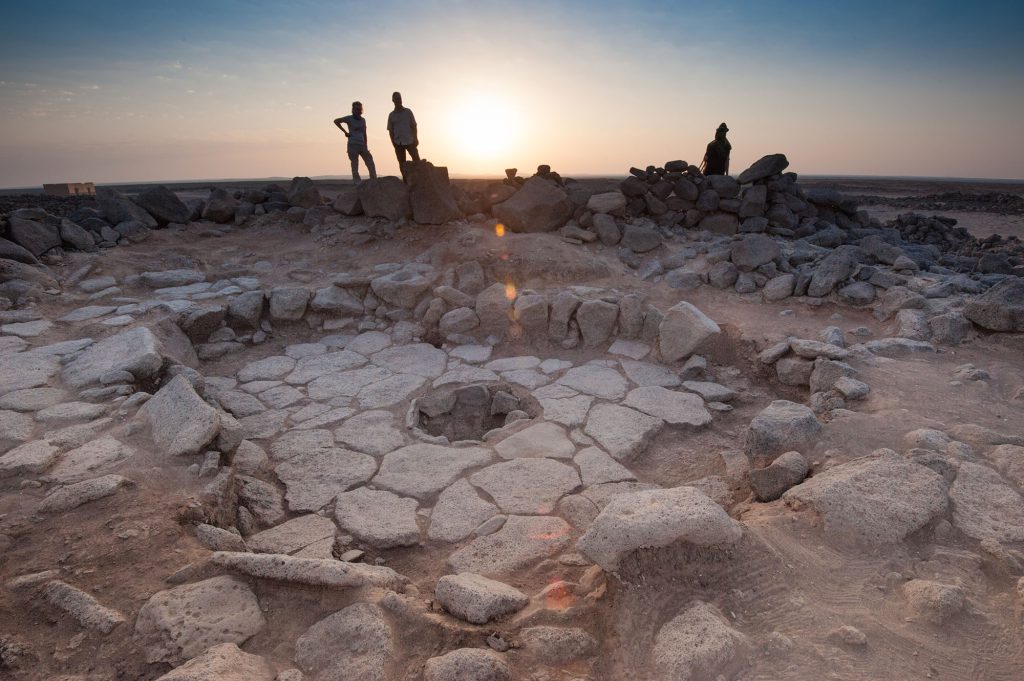 The world’s oldest bread crumbs found to date were excavated from the stone-lined fireplace in the center of this photo.