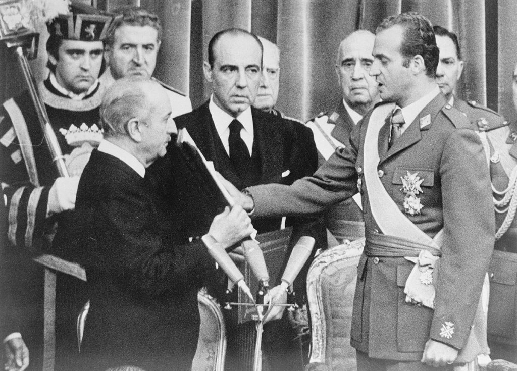 Prince Juan Carlos takes the oath of his throne in Madrid as the monarchy is reintroduced in Spain following the death of Franco in 1975.