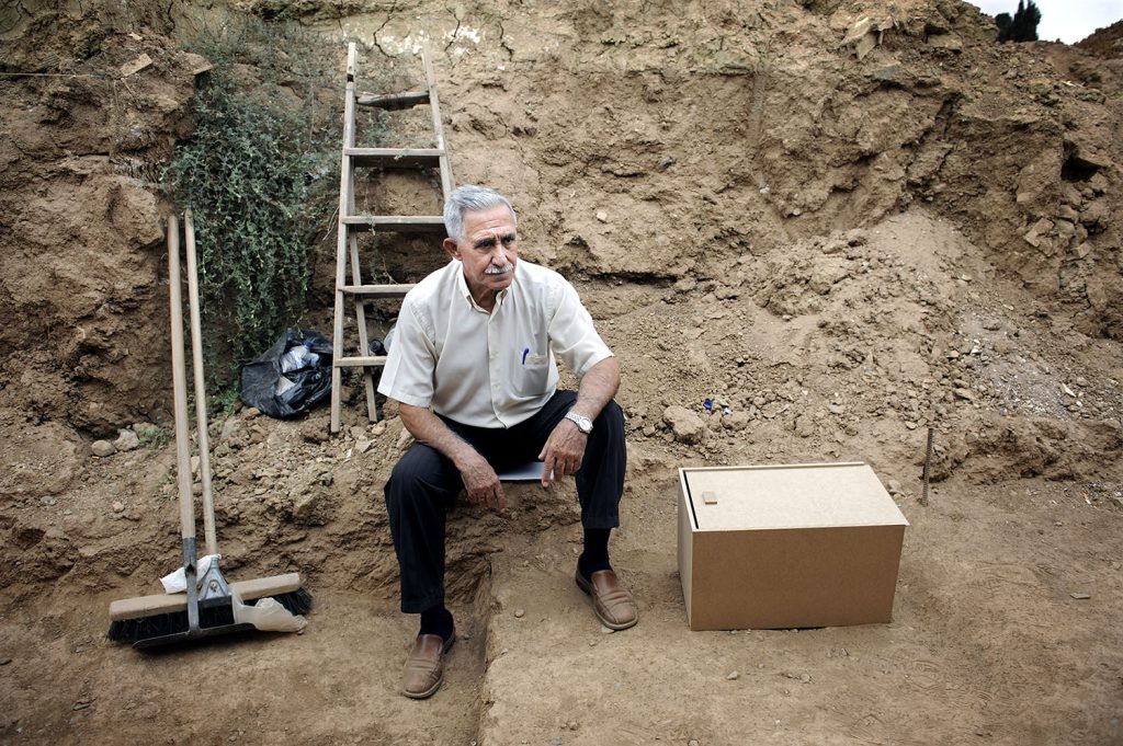 Pepe Dorado Cubero takes a break in 2008 from assisting with the exhumation of human remains at a mass grave in San Rafael, Malaga, Spain, containing the remains of 2,840 people executed by the Franco dictatorship. Cubero hopes to one day find the remains of his father, Pedro Dorado Cruces, who was executed in Malaga at the age of 33 on March 17, 1937.