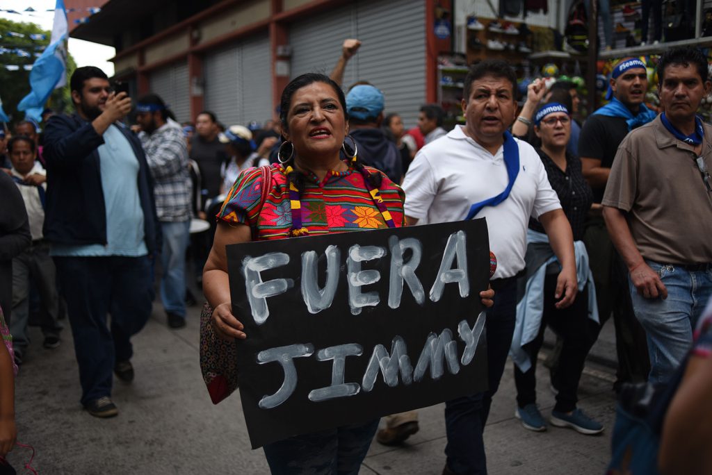 Protestors in Guatemala City call for the resignation of Guatemalan President Jimmy Morales this September in response to his announcement that a U.N.-backed anti-corruption commission, which has been investigating Morales for alleged corruption, would be expelled from the country.