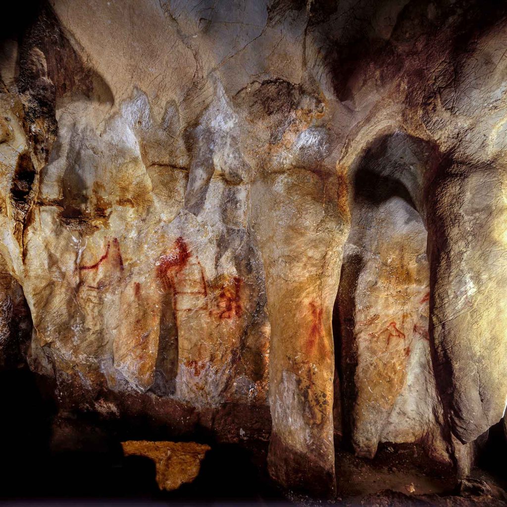 These painted patterns and images in a Spanish cave were left by Neanderthal artists.