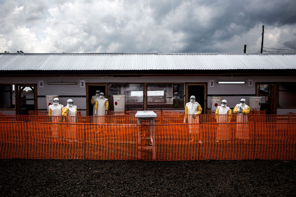 In November, health workers gather inside an Ebola treatment center in Bunia, Democratic Republic of the Congo.