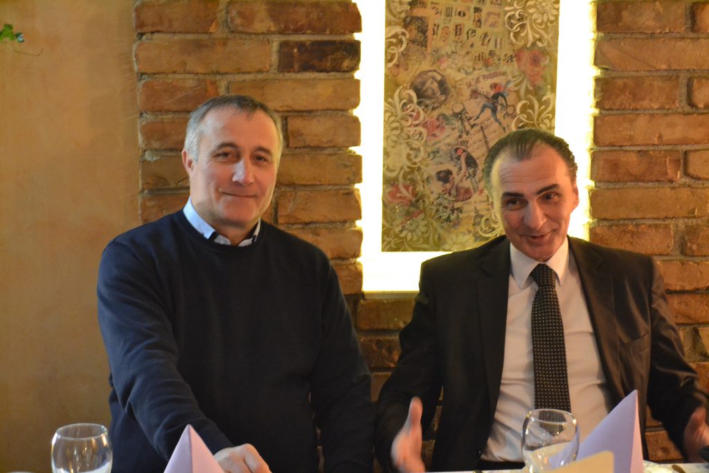 Mile Milošević (left), president of the Serbian War Veterans’ Association, dined with Enver Krluć (right), president of the Veterans Union of Bosnia-Herzegovina, in an effort to reconcile opposing sides from the Yugoslav wars.