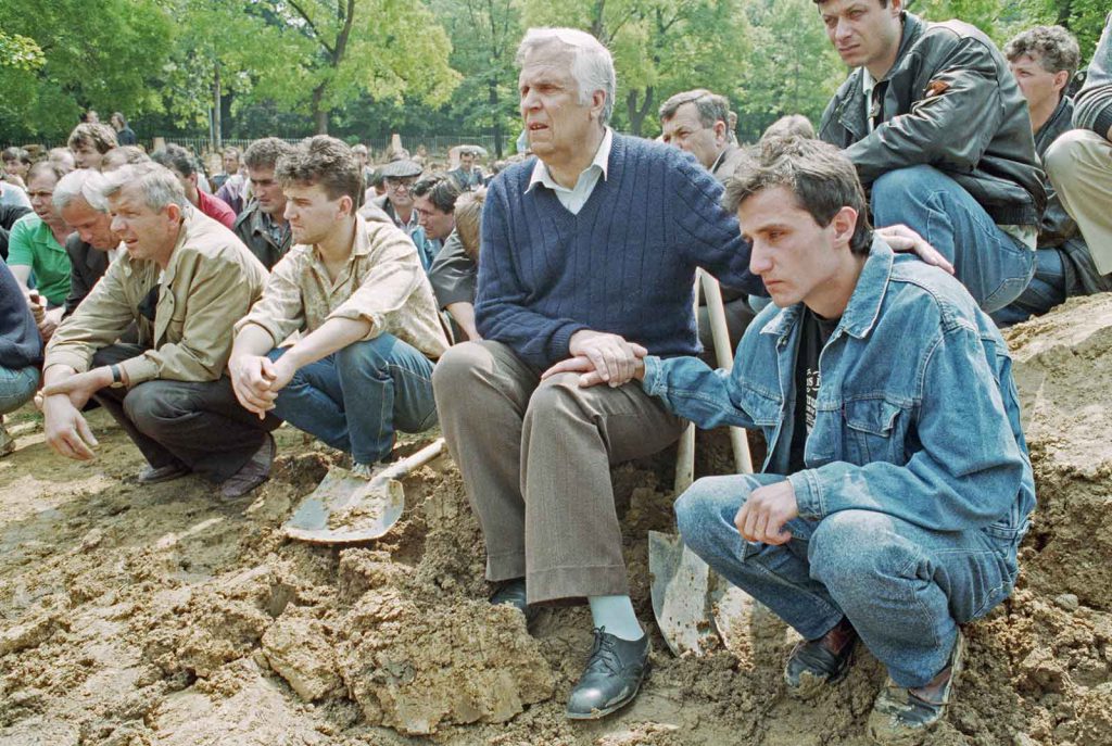 Mourners gather at the Sarajevo Lions Cemetery to honor their loved ones killed during the Yugoslav wars.