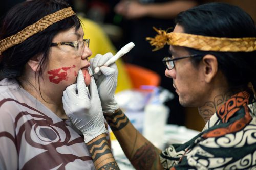 Native american tattoos - Nahaan, a Tlingit-Inupiaq-Paiute tattoo artist, inks a woman’s face.