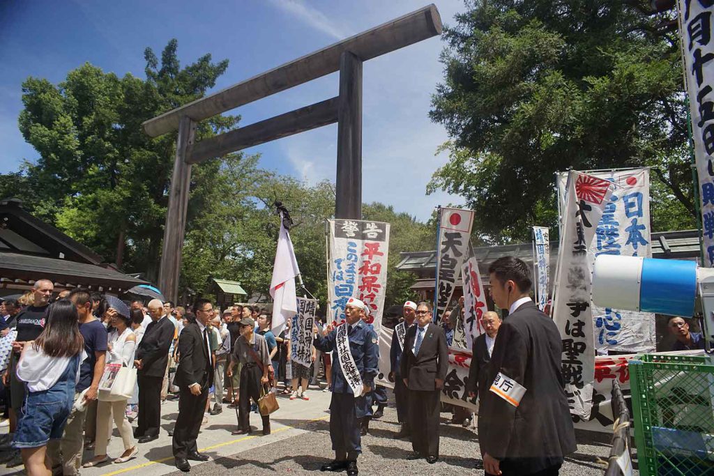Members of a nationalist group visit the Yasukuni shrine in Tokyo on August 15, 2018, the 73rd anniversary of Japan's WWII surrender.