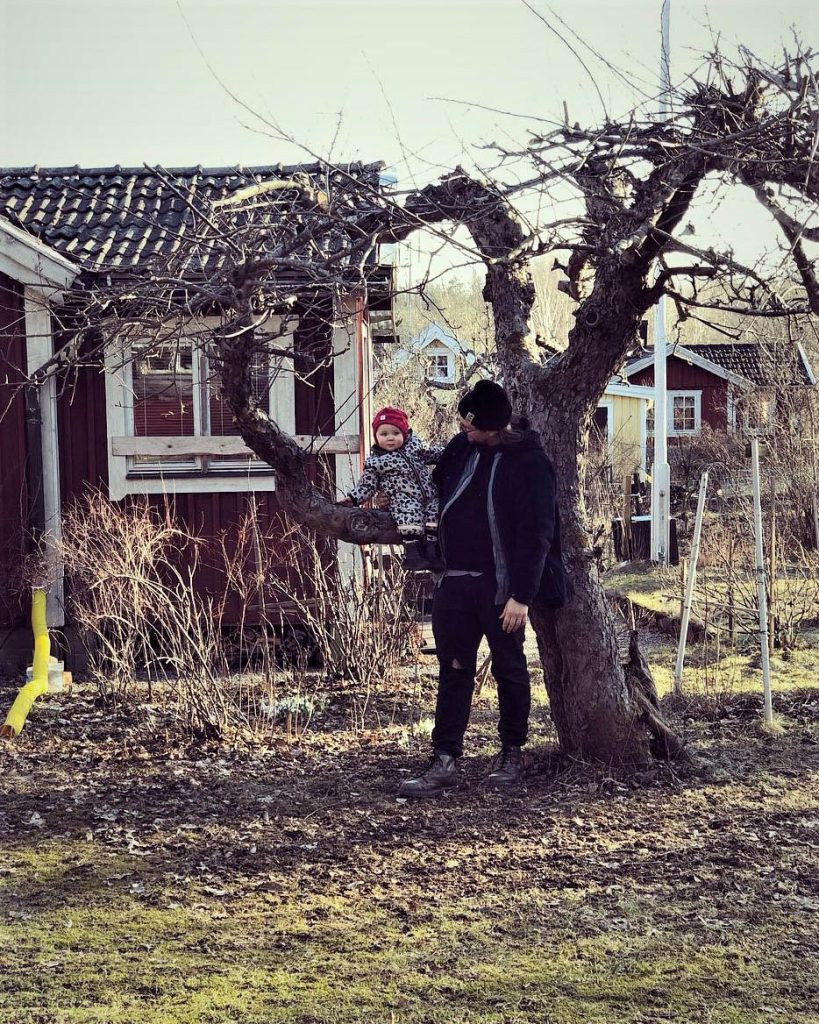A child in Sweden plays with his dad, who is on parental leave.