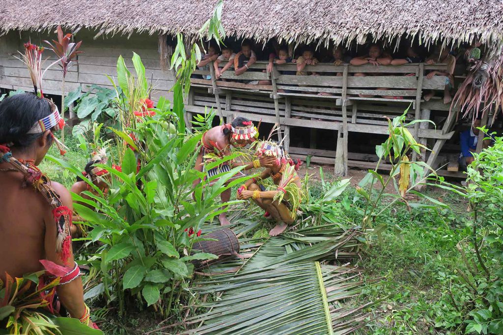 A shaman treats an initiate’s eyes to help him gain the ability to see spirits.